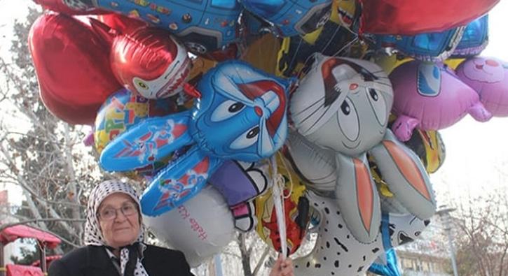 73 yandaki Melahat Nine, balon satarak evini geindiriyor