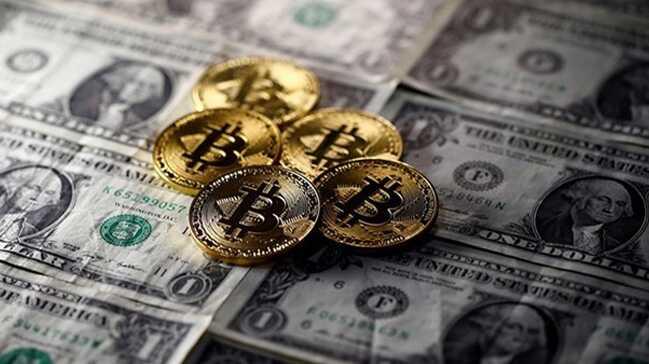 Bitcoin yeniden dokuz bin dolar at