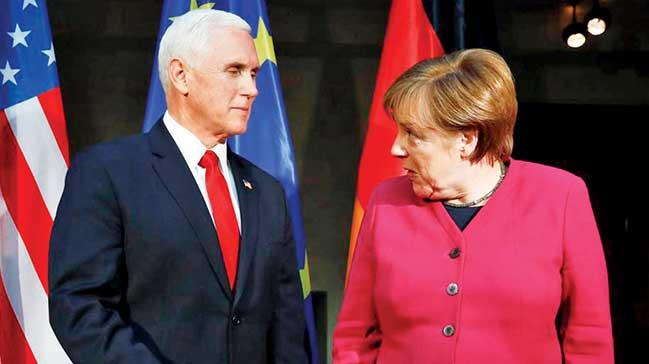 Merkel eletirdi Pence tehdit etti