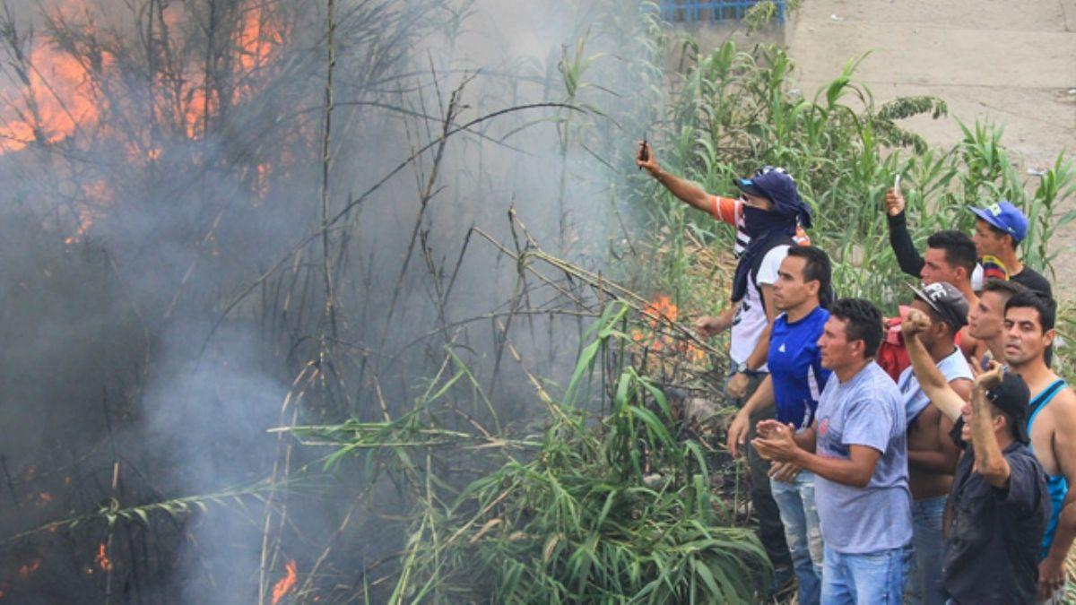 Venezuela'da halka datlmas ngrlen gda maddelerinin olduu depolarda yangn kt