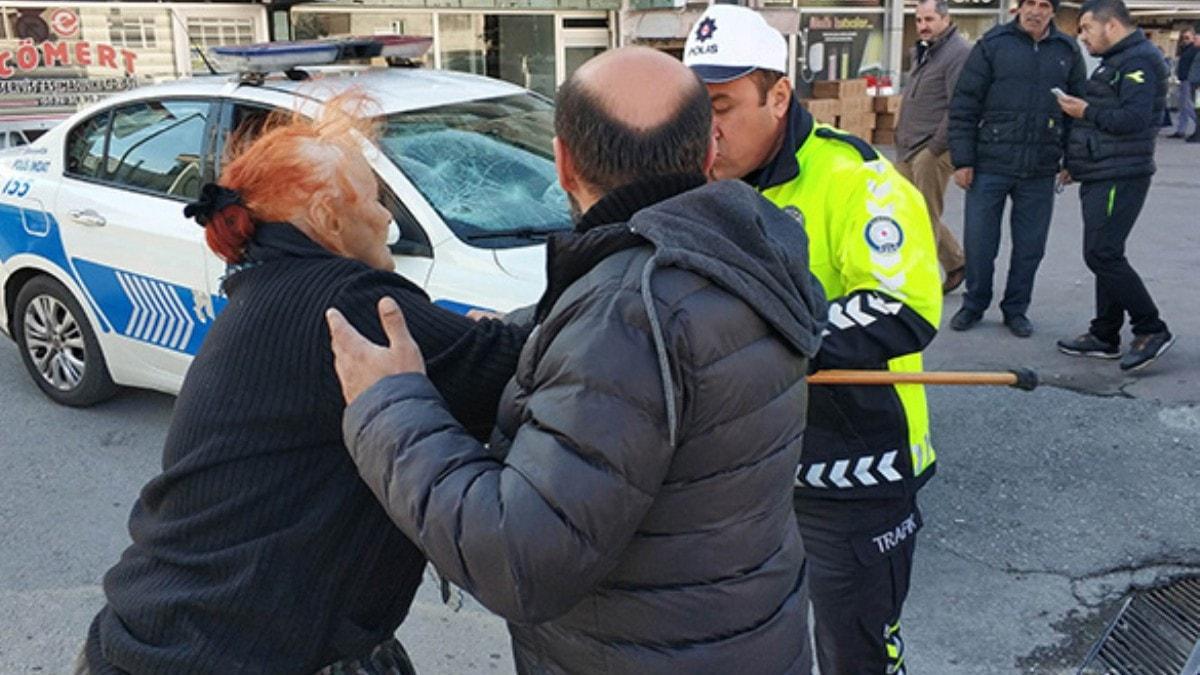 Src polis aracnn camn krd, annesi de bastonla polise saldrd