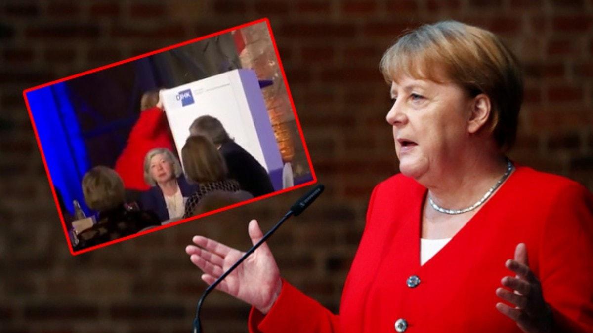 Salondakilerin yrei azna geldi! Merkel krsye karken yere dt