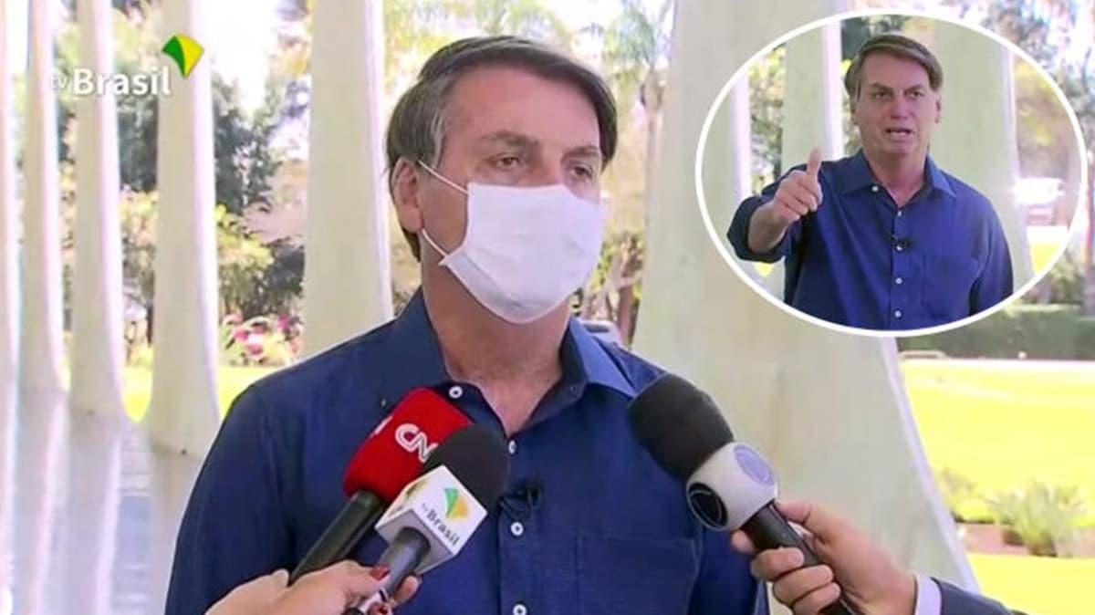Koronaya yakalanan Brezilya Devlet Bakan Jair Bolsonaro basn toplantsnda maskesini kard: Gazeteciler dava aacak