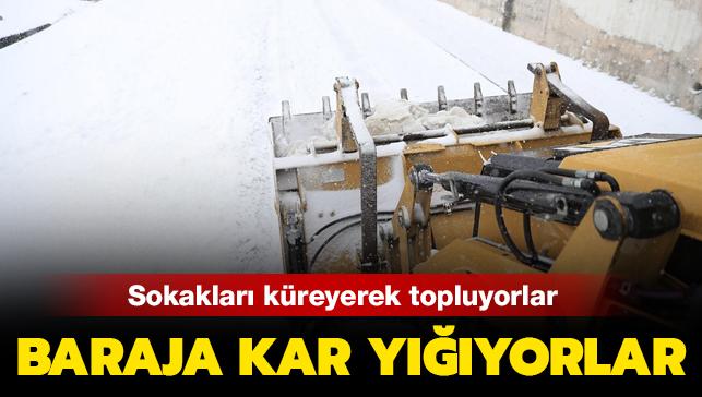 Sultangazi Belediyesi ekipleri sokaklardan topladklar kar baraja dkyor