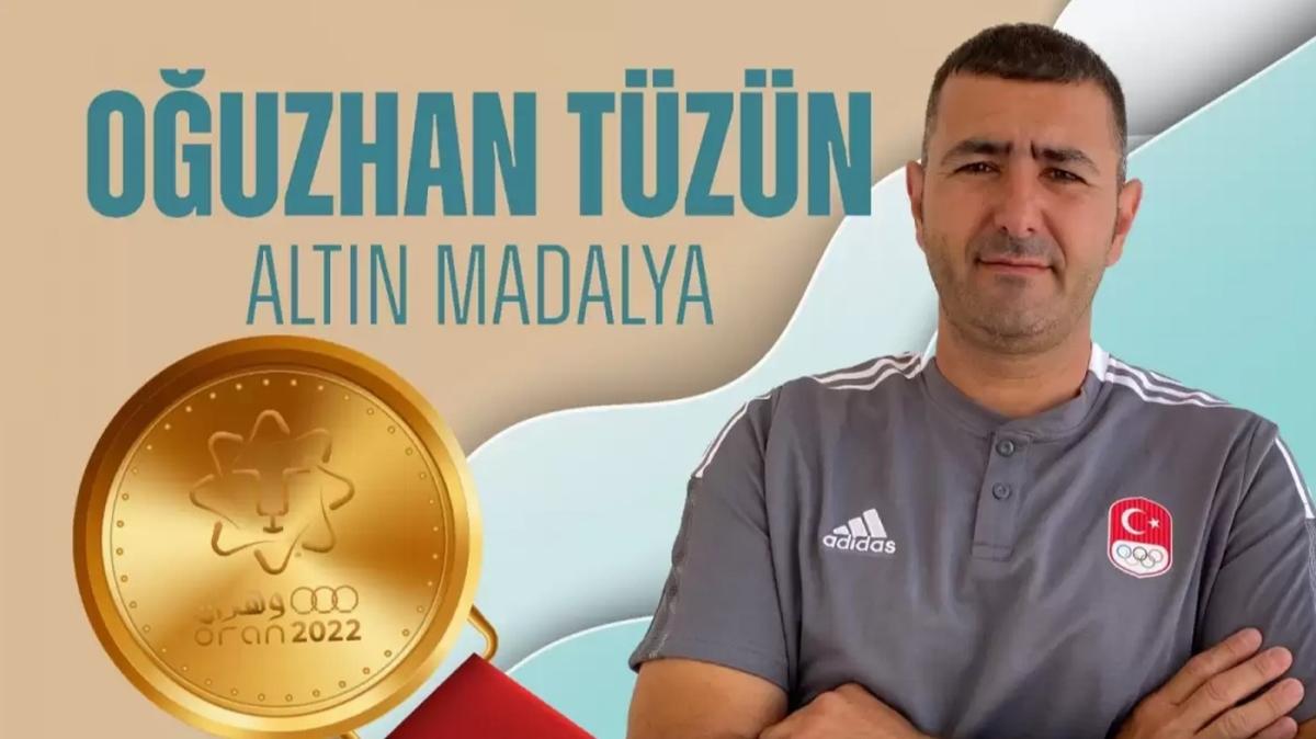 milli sporcu o�uzhan t�z�n alt�n madalya foto�raflar� resimleri
