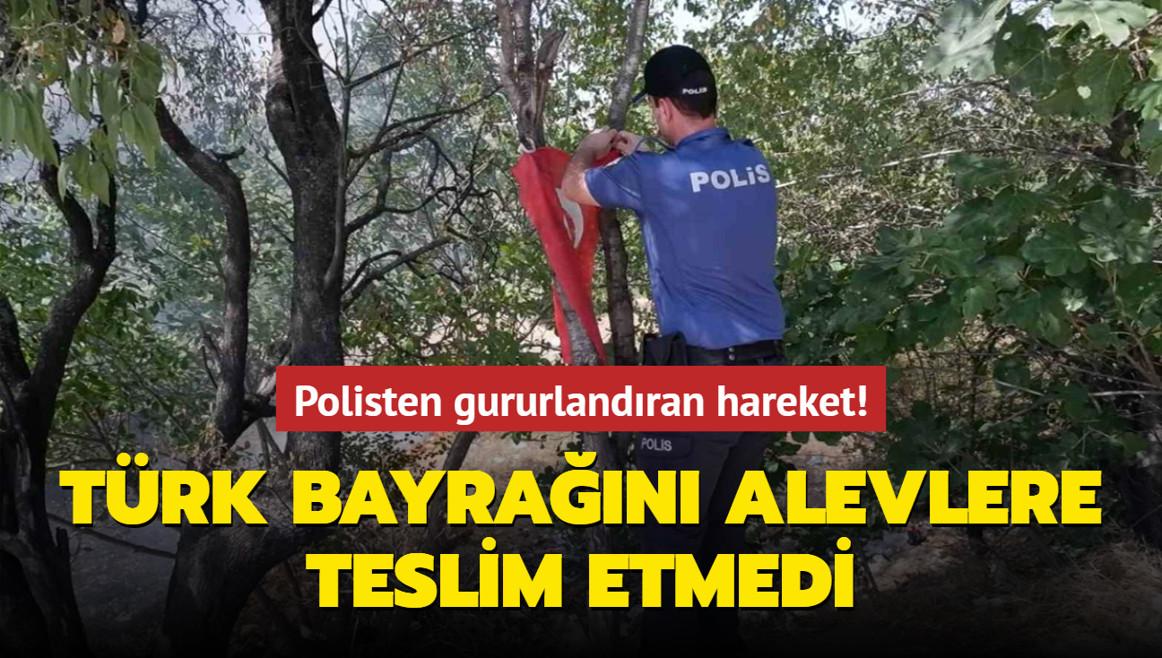 Polisten gururlandran hareket! Trk bayran alevlere teslim etmedi