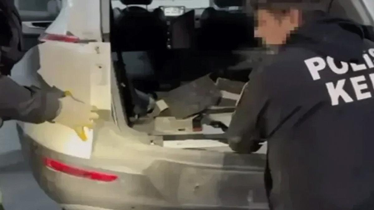 ran plakal arata zulalanm 34 kilo eroin ele geirildi