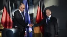 Scholz grevini Merz'e devretti