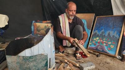 Filistinli sanat Taha Ebu Gali, tablolarn paralamak zorunda kalyor