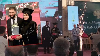 Diplomasn einin elinden ald... ara'nn ei Latife el Durubi mezun oldu