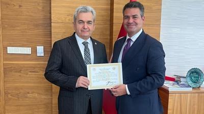 Yeniky Kemerky Enerji'ye 4 milyon fidan iin takdir belgesi