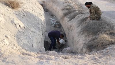 Suriye'de devrik rejimin kal�nt�lar�... Yeni bir toplu mezar bulundu