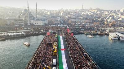 1 Ocak'ta insanl�k bulu�mas�! On binler Gazze i�in y�r�yecek