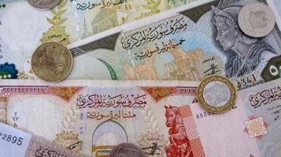Suriye'de para reformu: �ki s�f�r at�lan banknotlar tedav�le giriyor