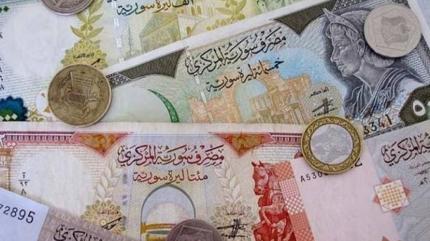 Suriye'de para reformu: �ki s�f�r at�lan banknotlar tedav�le giriyor