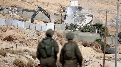 Soyk�r�mc� �srail, Bat� �eria'da Filistinlilere ait iki evi y�kt�