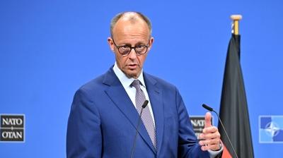 Merz'den Trump'�n tehditlerine rest: Gerekirse kendimizi savunuruz