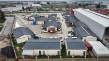 Depremlerden etkilenen Hatay'da ticari hayat ge�ici prefabrik �ar��larla canland�