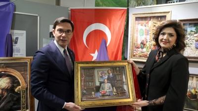 Ba�kan Yaz�c�o�lu'na babas� Vali Recep Yaz�c�o�lu'nun r�lyefi hediye edildi