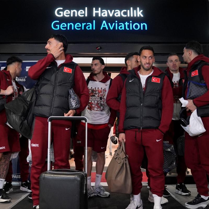 Milliler yurda d�nd�! Havaliman�nda co�kulu kar��lama