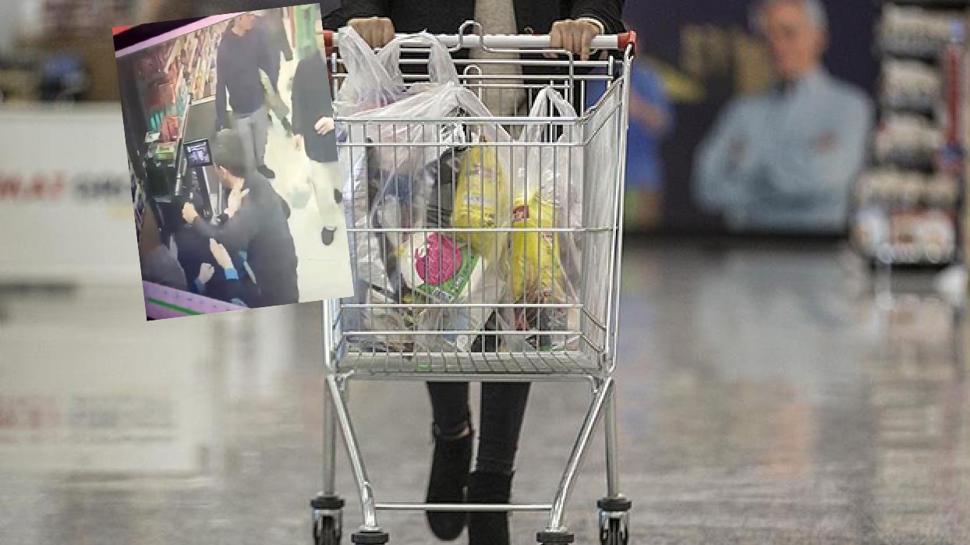 Poşet yüzünden dehşeti yaşattı! Kadın kasiyere yumruklu saldırı