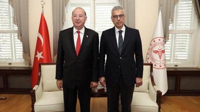 Bakan Memi�o�lu, KKTC'li mevkida�� ile bir araya geldi