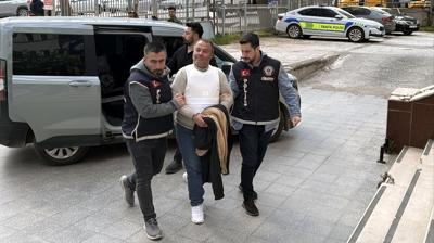 Belediye garaj�nda cinayet: Zanl� metruk binada yakaland�