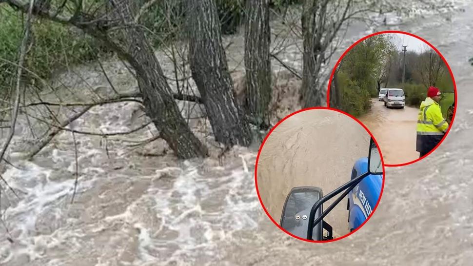 Dere taşkını yolu esir aldı: Araçlar kontak kapattı