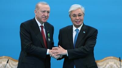 Ba�kan Erdo�an'dan Kazakistan'da ilk mesaj: T�rk d�nyas� y�zy�l� yapaca��z