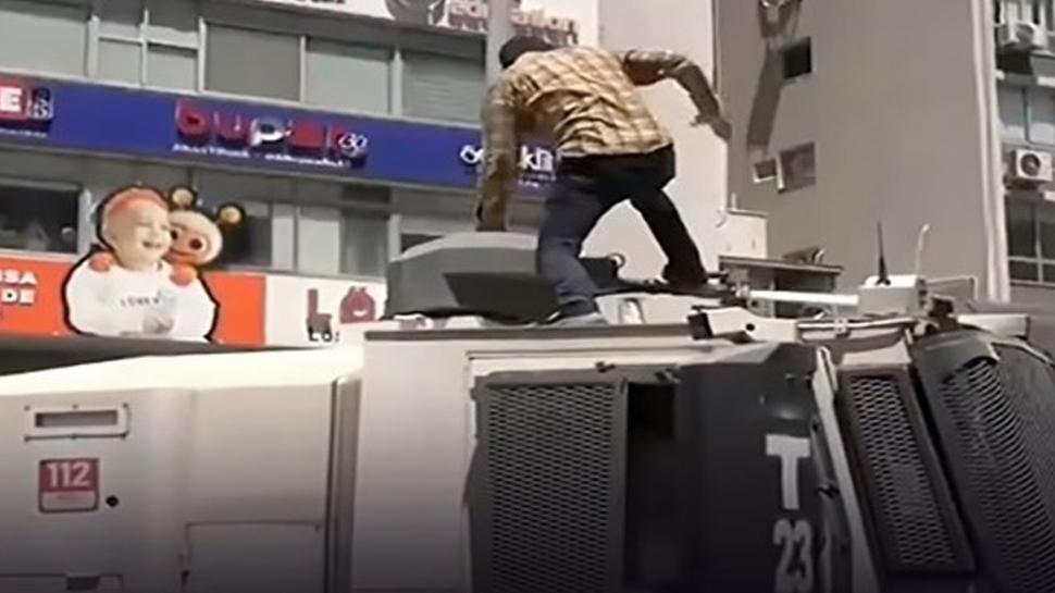 �zmir'deki TOMA sald�rgan� devlet memuru ��kt�! �stanbul Valili�i'nden jet karar