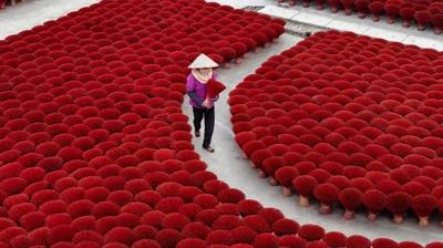 Vietnam'da zaman�n durdu�u yer: Bambunun k�rm�z�ya d�n��t��� k�y