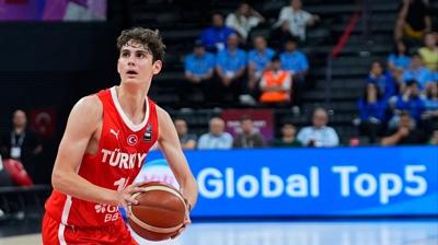 Gen� basketbolcu �mer Kutluay, tarihe ge�ti