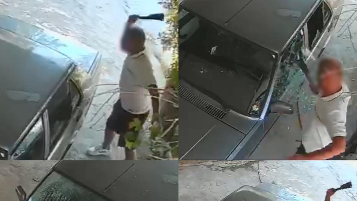 3 dakika boyunca dehşet saçtı: Eski sevgilisinin aracını satırla parçalandı