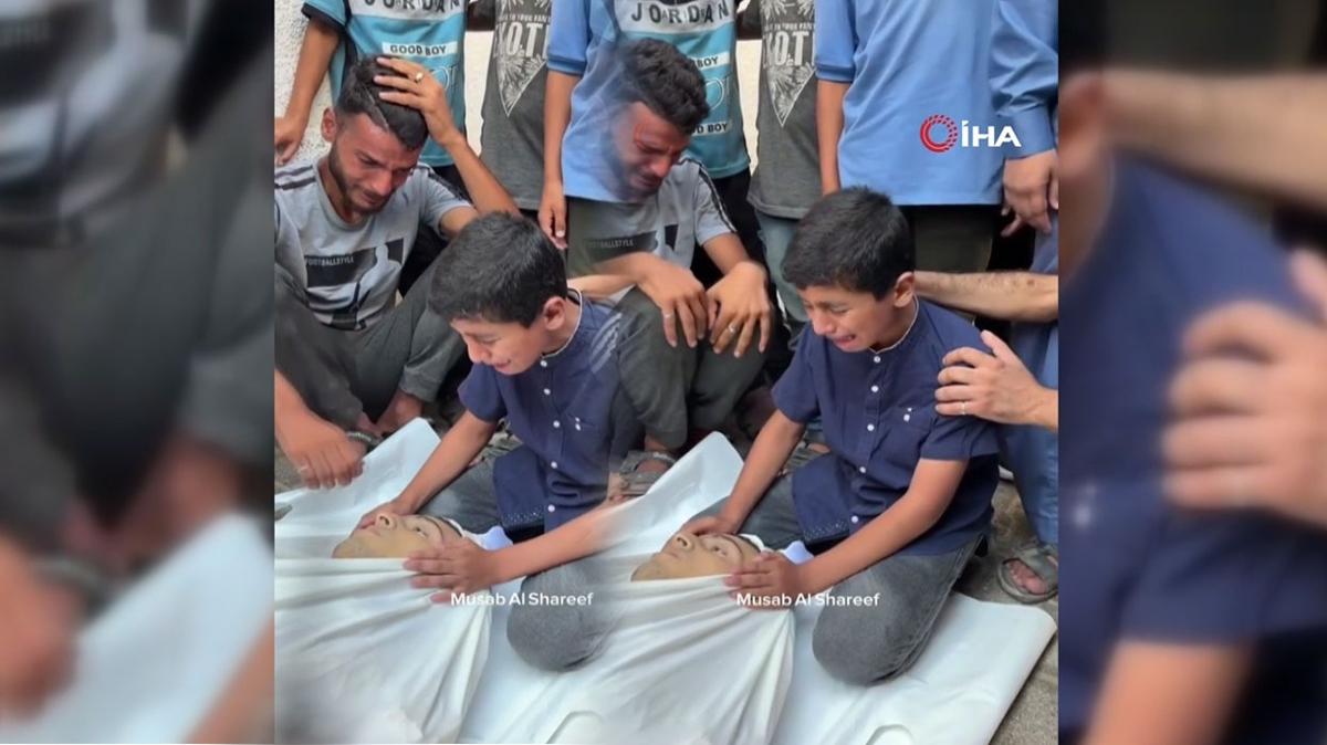 Gazze'de sözün bittiği yer! İsrail'in katlettiği kuzeninin başında Kur'an okudu
