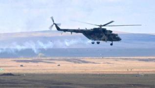 Eitim uuu yapyordu... zbekistan'da askeri helikopter dt
