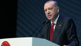 Bakan Erdoan aklamalarda bulunuyor