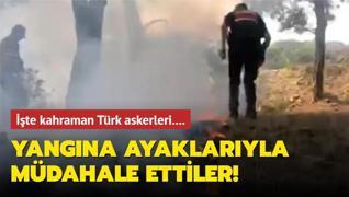 İşte kahraman Türk askerleri... Yangına ayaklarıyla müdahale ettiler