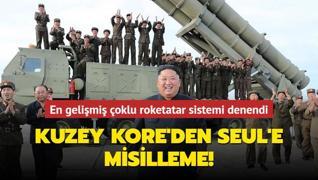 Kuzey Kore'den Seul'e misilleme... En gelimi oklu roketatar sistemi denendi