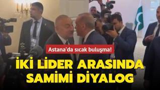 Astana'da scak buluma! Bakan Erdoan ile Aliyev arasnda samimi diyalog