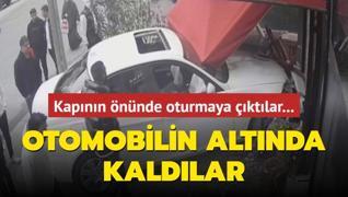 Kapnn nnde oturmaya ktlar! Otomobilin altnda kaldlar