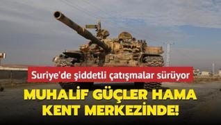 Suriye'de iddetli atmalar sryor... Muhalif gler Hama kent merkezinde!