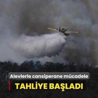 Alevlerle cansiperane mcadele: Vatandalarn tahliyesi balad