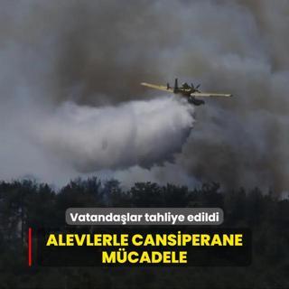 Alevlerle cansiperane mcadele: Vatandalar tahliye edildi