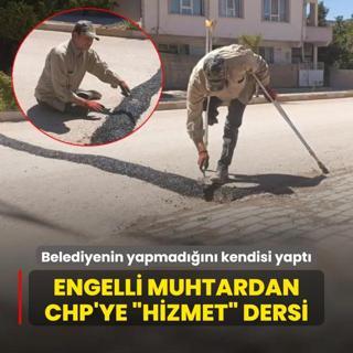 Engelli muhtardan CHP'ye hizmet dersi! Belediyenin yapmadn kendisi srnerek yapt