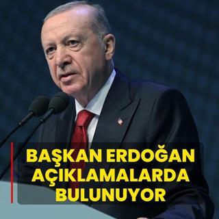 Bakan Erdoan aklamalarda bulunuyor