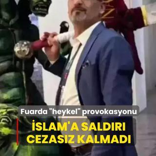 slam'a saldr cezasz kalmad! Fuarda heykel provokasyonu