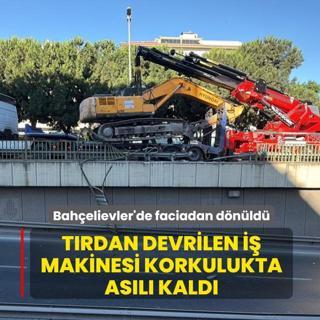Bah�elievler'de faciadan d�n�ld�... T�rdan devrilen i� makinesi korkulukta as�l� kald�